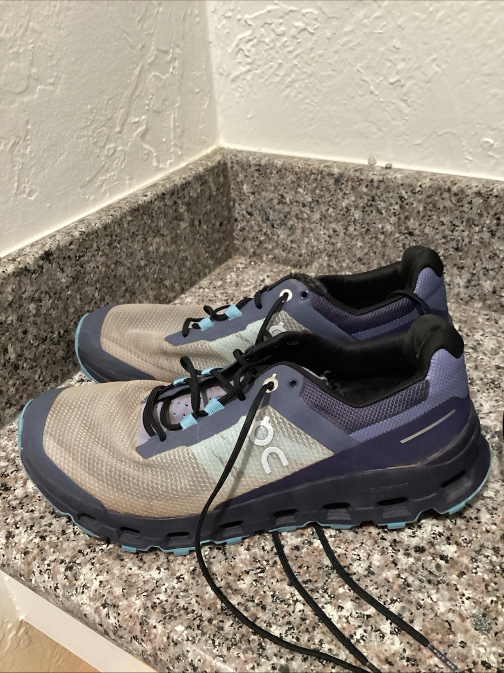 On Running Women's Trail Runners in Gray and Blue